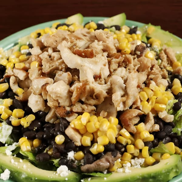 Sancho's Taqueria's chicken salad with corn, black beans, avocado, and crumbled cheese.